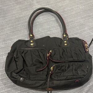 MZ Wallace Black Baby Bag with Gold Accents